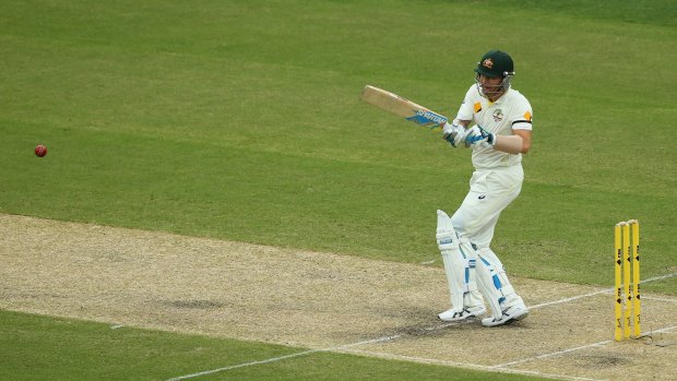 Injured captain Michael Clarke bats on day two.