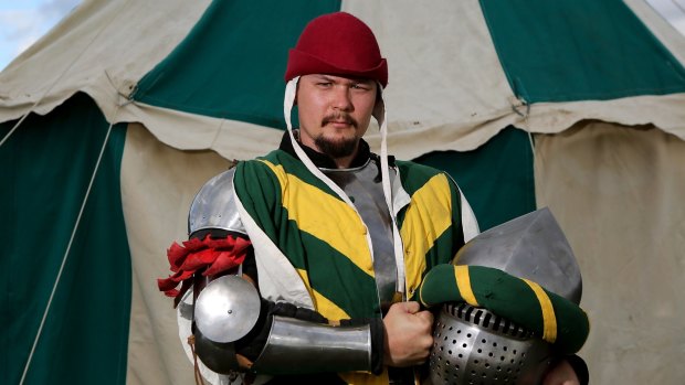 Medieval fighter Aaron Flores has recently returned from the Battle of Nations World Championships in Prague. He is dressed up in his fighting outfit including helmet at History Alive - A Journey Through Time at Fort Lytton on Saturday.