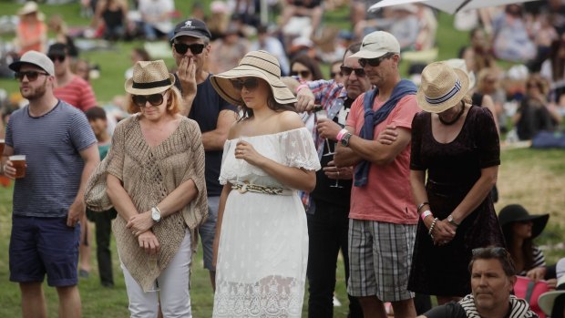 Festival goers during the minute silence at the So Frenchy so Chic in the Park.
