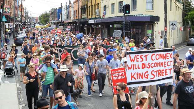Concerned residents take to the streets of Newtown, Sydney, to protest the proposed development of the NSW government's WestConnex tunnel and road project.