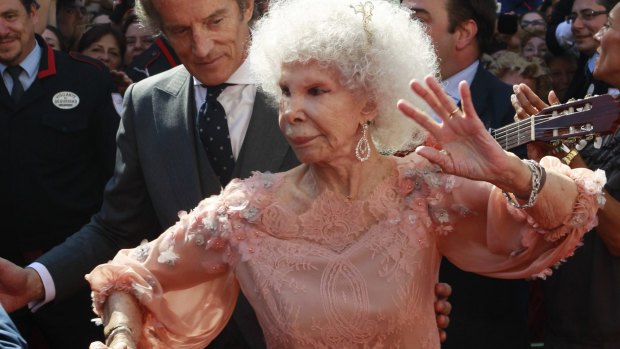 The Duchess of Alba flamenco dances beside her husband Alfonso Diez after their wedding in 2011.