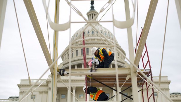 The inauguration platform is prepared on the Capitol steps in Washington. 