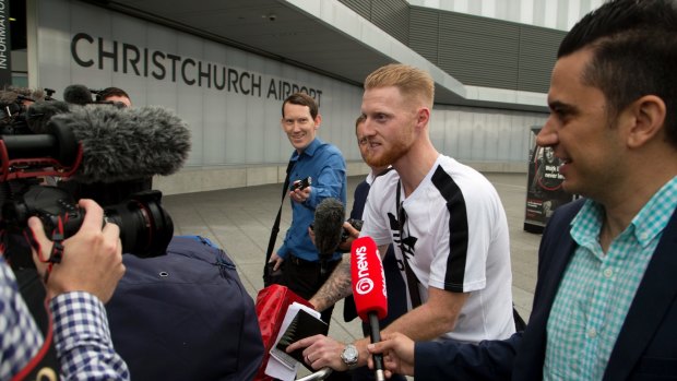 Ben Stokes is surrounded by media as he arrives in Christchurch.