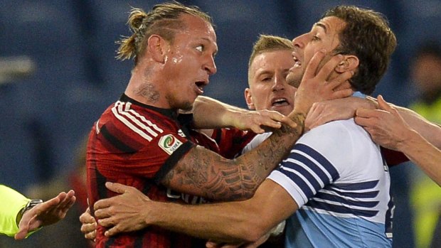 Seeing red: Phillipe Mexes was sent off after a series of altercations with Stefano Mauri.