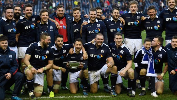 No longer the easy beats: Scotland celebrate their win over Ireland.
