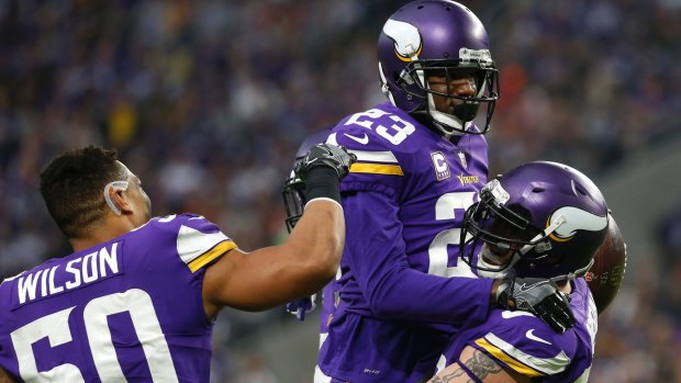 The Vikings won the division crown for the second time in three years.