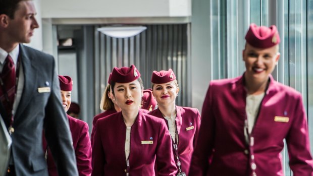 The Qatar crew disembark the plane for a brief stopover in Canberra before the flight to Doha.