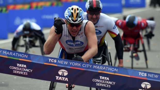 King of New York: Kurt Fearnley wins the men's wheelchair division of the New York Marathon last Monday.