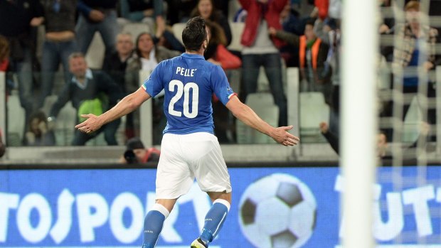 Italy's Graziano Pelle celebrates his goal.