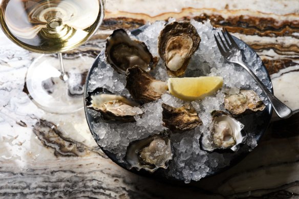 The bar's namesake items come from a 500-strong Burgundy collection and a daily line-up of oysters from various producers. 