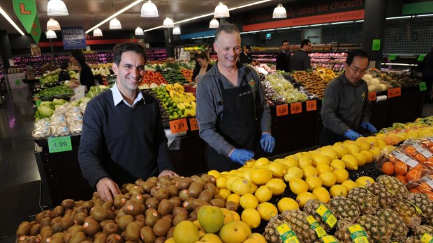 Theo Koundouris, left, at the Canberra Centre Supabarn store which has now been bought out by Coles.