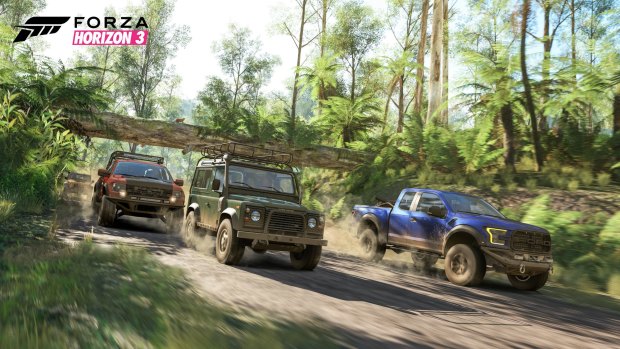 Trucks take a race through the rainforest.