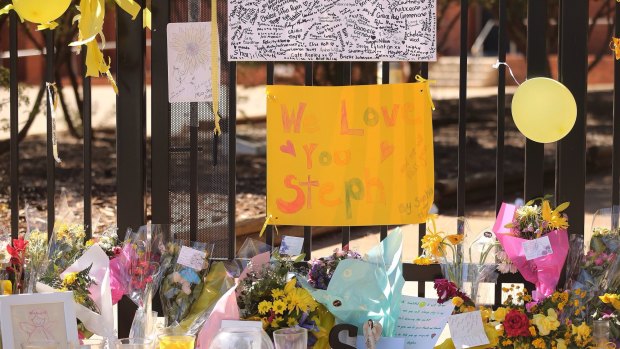 Messages from friends, students and the community to murdered Leeton school teacher Stephanie Scott and her family on the fence in front of Leeton High School.