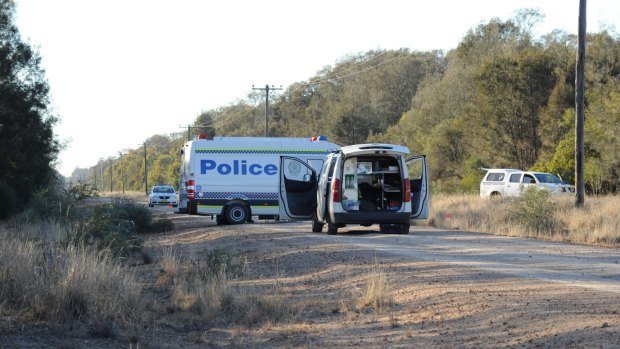 Police block off the road at Talga Lane on the Newell Highway at Croppa Creek after the fatal shooting. 