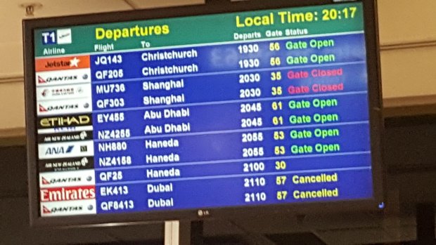 The departures board at Sydney Airport on Wednesday night, showing cancelled flights to Dubai.
