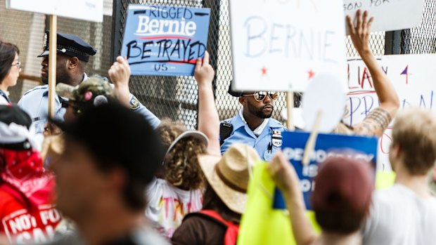 Furious protesters block the entrance to the closest subway station to the Wells Fargo Centre where the Democratic convention is being held.  