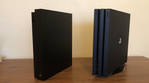 The Xbox One X and last year's supercharged PlayStation, the PS4 Pro.