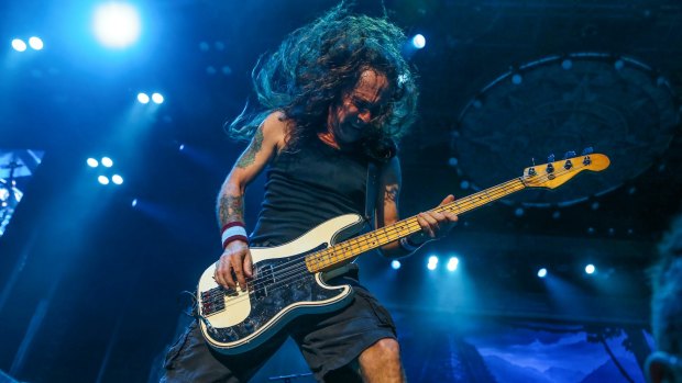 Bass player Steve Harris prowled the stage in his knee-length shorts and waist-length hair.