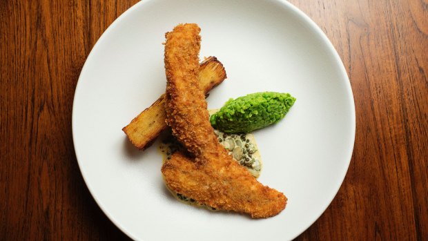 Crumbed flathead, pommes Anna and crushed peas with warm tartare sauce.