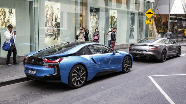 Eye-catching: The BMW i8 draws more looks than the famously attractive Aston Martin Vanquish.