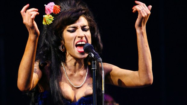 The blue dress Winehouse wore to Glastonbury in 2008 is part of the exhibition.