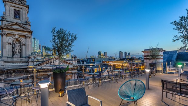 Panoramic city skyline views make the rooftop bar a plum spot.