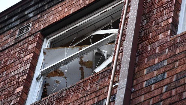 A window is blown out in a top floor Bondi Junction apartment from a suspected gas explosion left a man with serious burns on Friday morning.