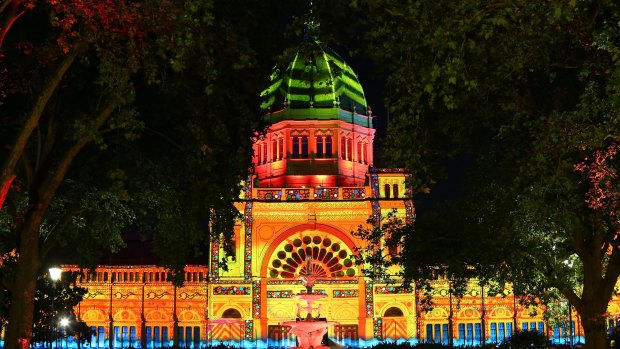 Artwork by The Pitcha Makin Fellas and OCUBO is projected onto the Royal Exhibition Building as part of this year's White Night Melbourne.