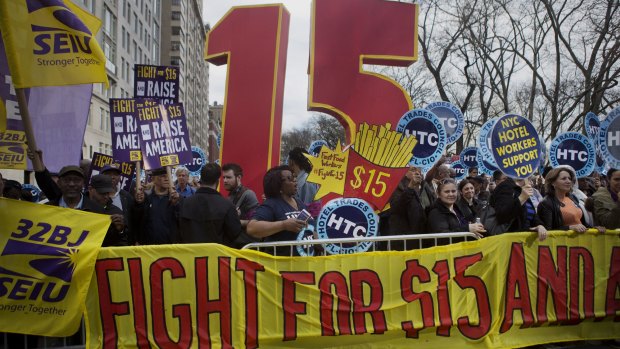 Fast-food workers held rallies in 236 US cities on Wednesday in their biggest protest yet for higher pay and union rights.