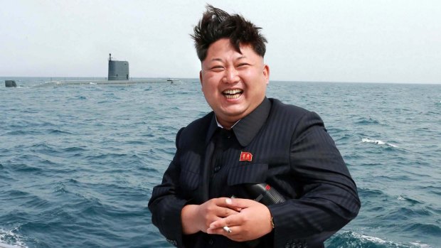 North Korea's official Korean Central News Agency says this photo shows leader Kim Jong-Un observing an underwater test-fire of a submarine-launched ballistic missile at an undisclosed location.