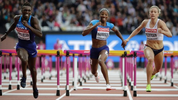 American Kendra Harrison (centre) almost did not make the hurdles final.