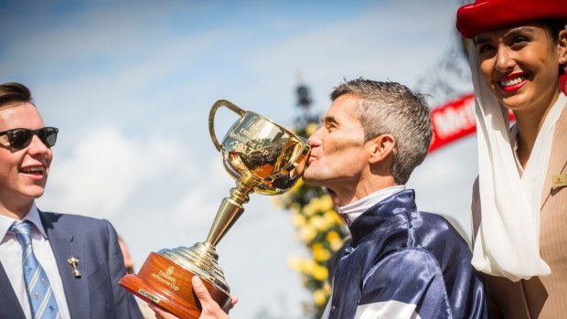 Jockey Corey Brown celebrates Rekindling winning the 2017 Melbourne Cup, Flemington.