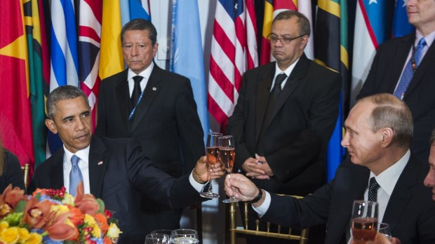 Chilly relationship ... US President Barack Obama, left, and Russia's President Vladimir Putin toast during a luncheon hosted during the 70th annual United Nations General Assembly at UN headquarters. 