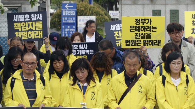 Family members of victims of the sinking of the ferry Sewol hold a press conference in Gwangju on Tuesday.