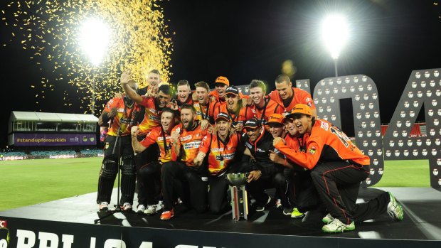 BBL champions: Perth Scorchers celebrate winning last season's Big Bash League final over the Sydney Sixers in Canberra.