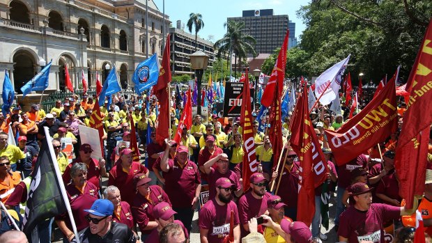 Protesters rally outside Parliament House