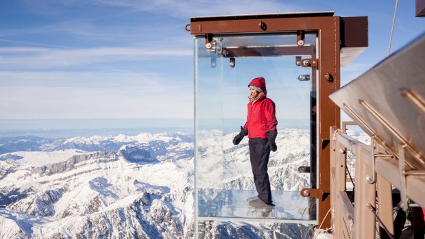 'Step into the Void' glass box on the Aiguille Du Midi mountain top above Chamonix Mont-Blanc.