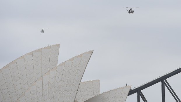 Police helicopters patrol the sky over Sydney ahead of New Year's Eve celebrations.