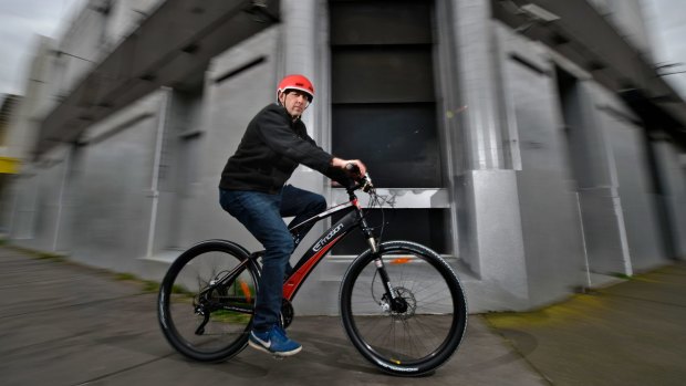 Baron Katrinski on an electric bike. Katrinski and business partner Nathan Reizer own Melbourne Electric Bicycles.