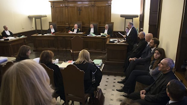 The defendants, including Francesca Chaouqui, against the wall on the right during their trial for allegedly leaking Vatican documents. 