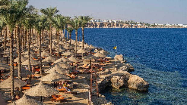 Russian holidaymakers are escaping a strict travel ban to take beach holidays in places like Egypt's red sea resort town of Hurgada.