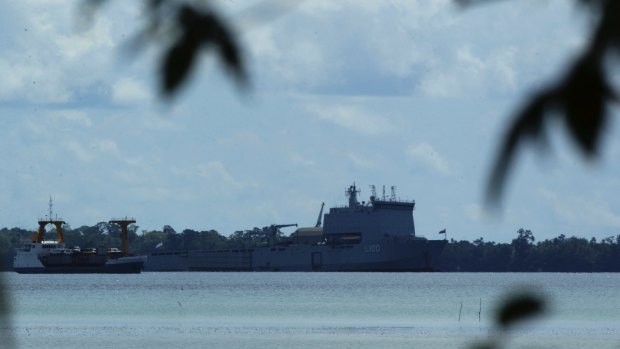 The HMAS Choules, pictured off Manus Island in 2013, is understood to have travelled south of Ho Chi Minh City to return 50 Vietnamese asylum seekers.