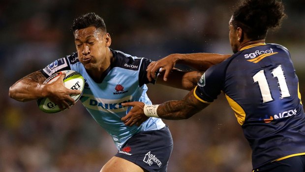 Staying put: Daryl Gibson says he wants Israel Folau to attack and defend at outside-centre this year for the Waratahs. 