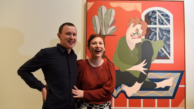 Mitch Cairns, the winner of the 2017 Archibald Prize, his winning painting and its subject, his partner Agatha Gothe-Snape.
