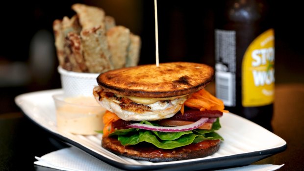 A Sweet Chilli Chicken buger on a Low Carb Super Bun with a beer and Zucchini chips from Grill'd.