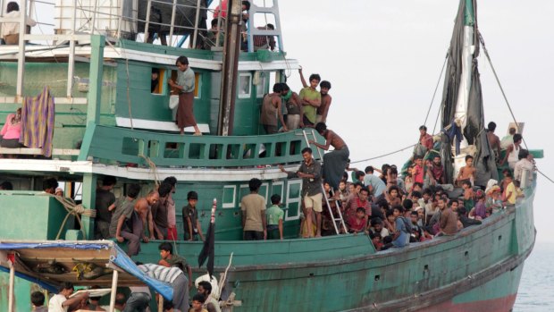 Rohingya and Bangladeshi refugees await rescue by Acehnese fishermen off East Aceh, Indonesia, in May 2015.