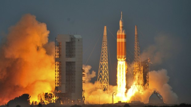 Blast off: The Delta IV Heavy rocket with the Orion spacecraft lifts off from the Cape Canaveral Air Force Station in Florida.