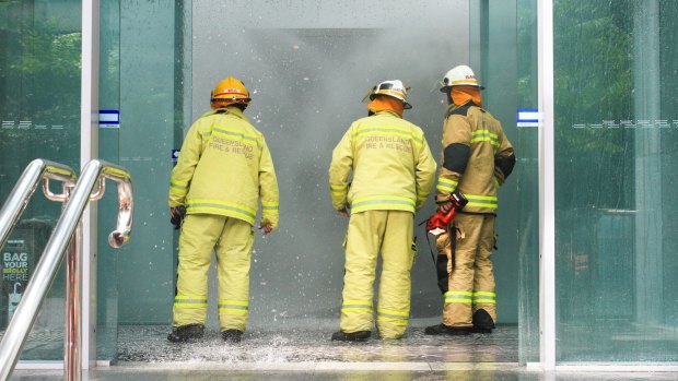 Firefighters respond to a fire alarm and building evacuation on Turbot Street, Brisbane.