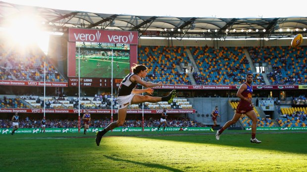 Port Adelaide's Jasper Pittard kicks the ball, as the Power dominated the Lions.