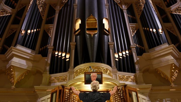 Organist Robert Ampt with the newly restored Sydney Town Hall organ.